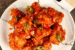 Alt text: "Close-up of crispy Korean fried chicken wings with a glossy, golden double-fried crust